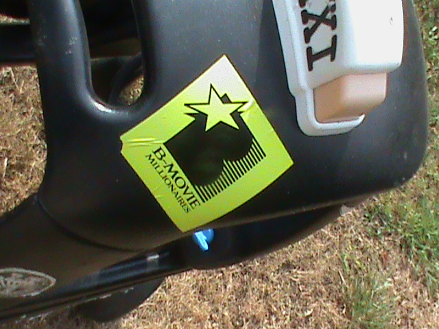 B-Movie Millionaires sticker on the roof of a Little Tikes toy car
